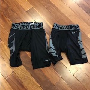 2 pairs of Nike pro combat compression shorts